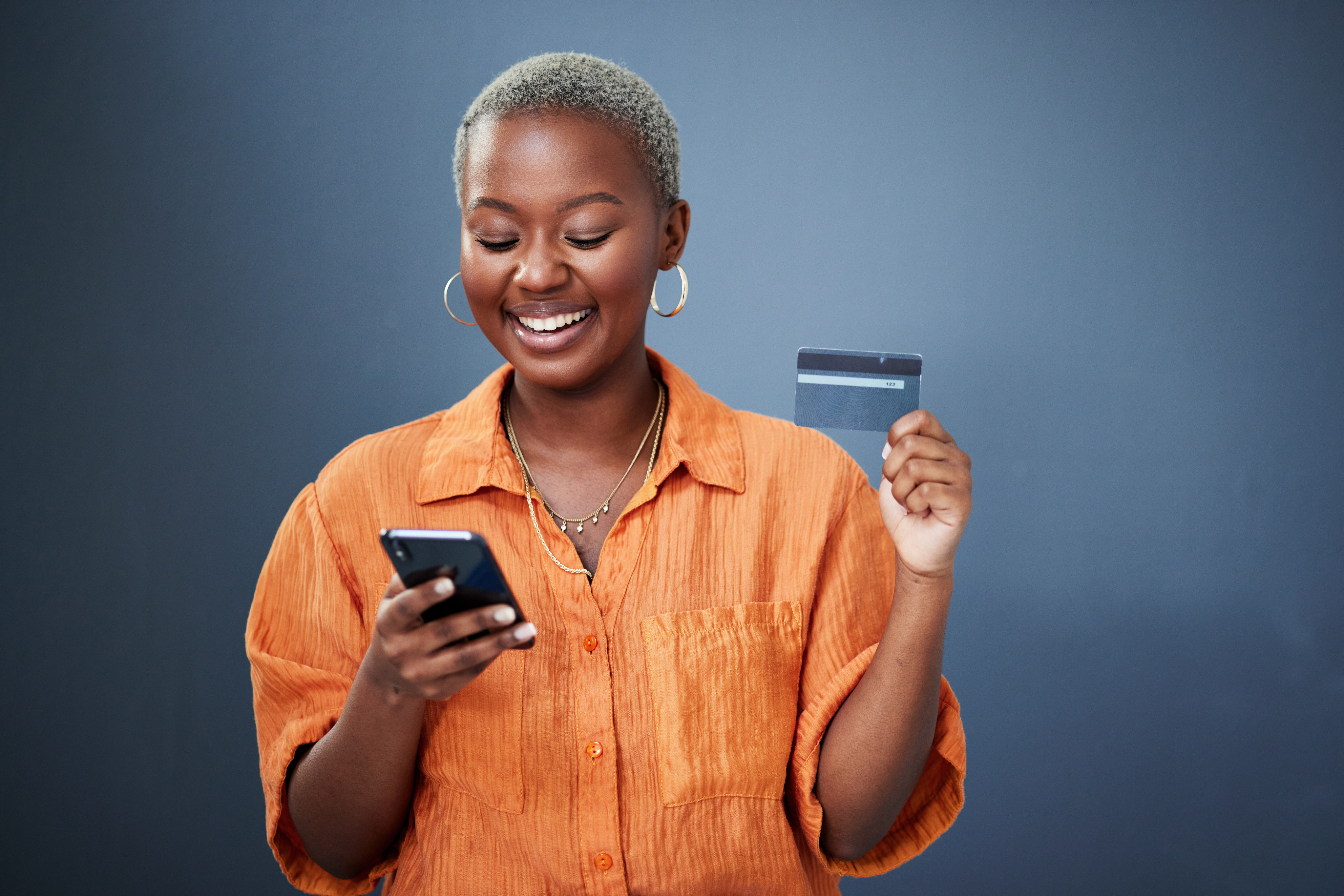 Freelancer reviewing payment on phone — confident and capable